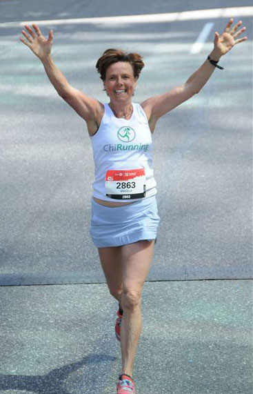 Angela James finishing the Boston Marathon in 2004